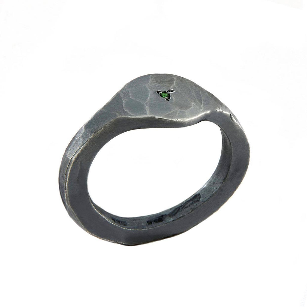 Carved ring with tsavorite